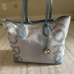 Michael Kors light blue & cream monogram bag.
